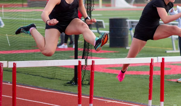 Front View Two High School Girls Running Hurdles Track Hurdle — Stock Photo, Image