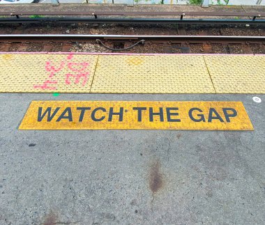 Watch the gap printed on a long island railroad train platform. clipart