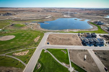 Saskatchewan, Saskatchewan 'da bir mahalle olan Brighton' un havadan görünüşü, şehrin doğu yakasındaki Holmwood Banliyö Geliştirme Bölgesi için planlanan birkaç topluluğun ilki..