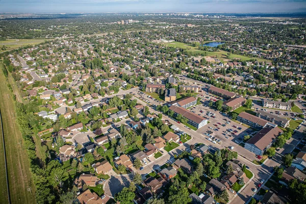 stock image Soaring over Lakeview in Saskatoon, this birds-eye capture magnifies the neighborhoods tranquil waters, verdant parks, and the serene rhythm of Saskatchewan living