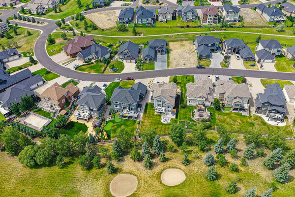Captivating aerial vantage of The Willows in Saskatoon, emphasizing the luxurious expanse of this enclave set amidst Saskatchewans vast and picturesque scenery