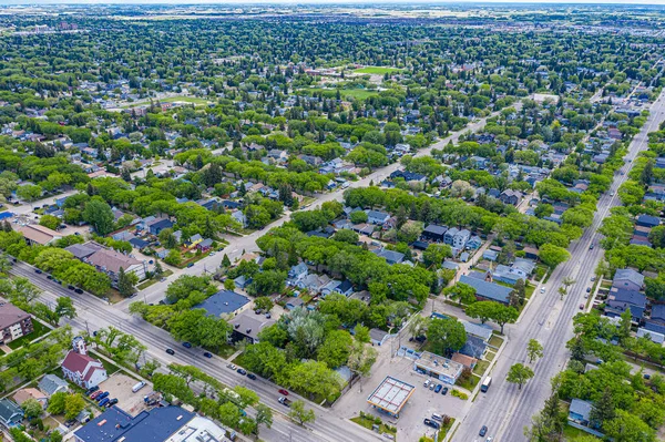 Explore the quaint Haultain neighborhood in Saskatoon from above. This drone image captures its charming streets, cozy homes, and the vibrant community spirit, all under the expansive prairie sky.
