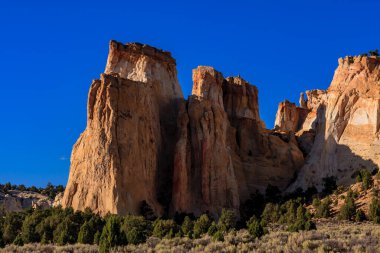 Grosvenor Arch is a unique sandstone double arch located in southern Utah.  The massive sandstone formation stands 152 feet high and spans 92 feet. clipart