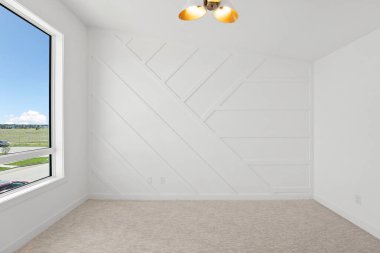 Beyaz duvarı ve penceresi olan beyaz bir oda. Oda boş ve basit bir tasarımı var.