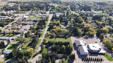 Waldheim Saskatchewan from above in 4K, showing homes, streets, and surrounding farmland.