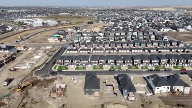 Stunning drone video of Rosewood Saskatoon showing residential streets, green spaces, and new developments in 4K.