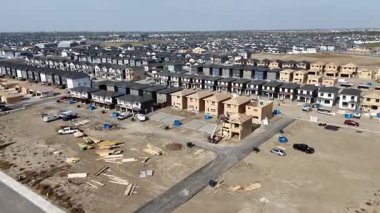 Aerial view of Rosewood in Saskatoon, highlighting modern homes, parks, and schools in this southeast community in crisp 4K.