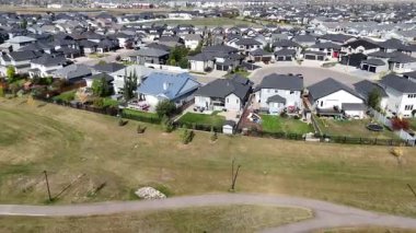 Drone video of Rosewood Saskatoon featuring a growing southeast neighborhood with homes, schools, and parks in 4K.