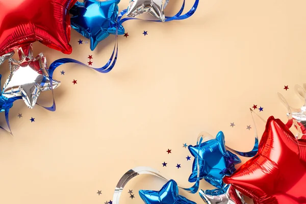 stock image Forth of July celebration concept. Top view photo of balloons in national flag colors serpentine and confetti on isolated beige background with empty space