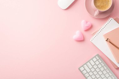 Valentine's Day concept. Top view photo of notebooks pen keyboard computer mouse heart shaped candles and cup of coffee on saucer on isolated pastel pink background with blank space