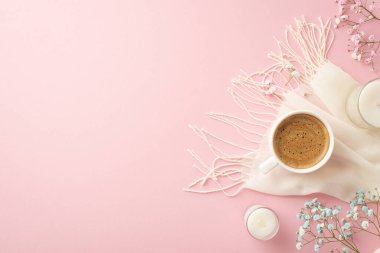 Hello spring concept. Top view photo of cup of fresh coffee candles in glasses gypsophila flowers and white scarf on isolated light pink background with blank space