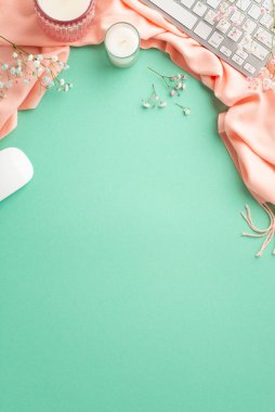 Spring season business concept. Top view vertical photo of keyboard computer mouse candles in glasses gypsophila flowers and pink soft plaid on isolated teal background with blank space