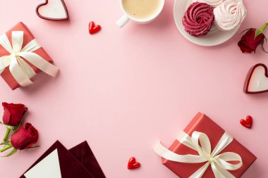 St Valentine's Day concept. Top view photo of red gift boxes envelopes plate with meringue cup of coffee heart shaped candles red roses on isolated pastel pink background with copyspace in the middle