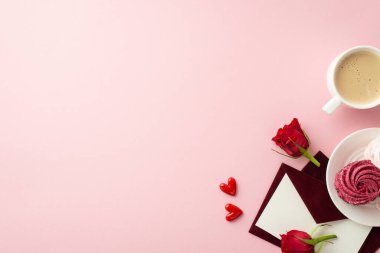 Women's Day concept. Top view photo of red envelopes with letter plate with meringue cup of fresh coffee small hearts and red roses on isolated pastel pink background with copyspace