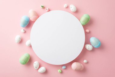 Easter concept. Top view photo of white empty circle green blue and pink easter eggs on isolated pastel pink background with copyspace