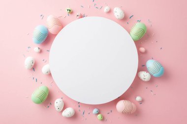 Easter decorations concept. Top view photo of white circle green blue pink easter eggs and sprinkles on isolated pastel pink background with copyspace