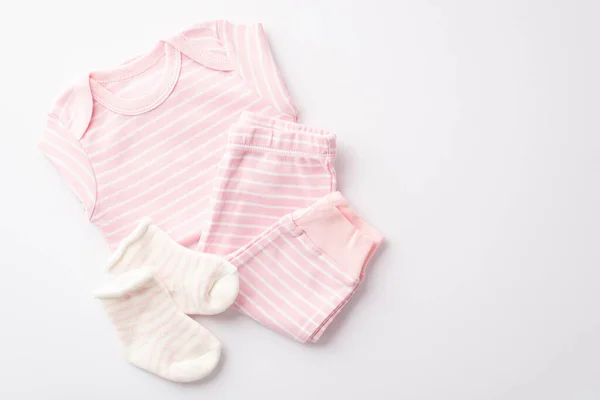 Conceito Banho Bebé Foto Vista Superior Roupas Infantis Rosa Calças — Fotografia de Stock