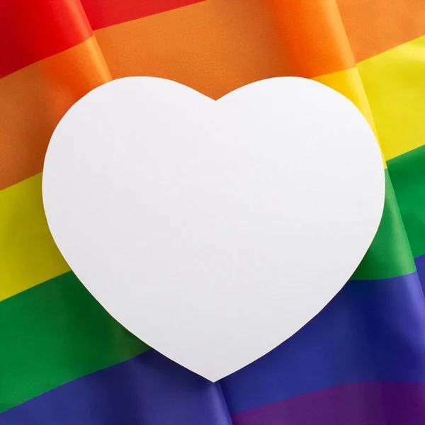 男同性恋 双性恋 变性者和变性者自豪饰物的顶部正方形垂直平面布局 如蓝色底色上的彩虹旗 空心支票或象征男女同性恋 双性恋和变性者历史月概念的广告 — 图库照片