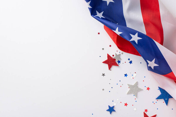 Labor Day in USA concept. Above view photo of empty space with white, blue and red star-shaped sparkles and american flag on the right on white isolated background with copy-space