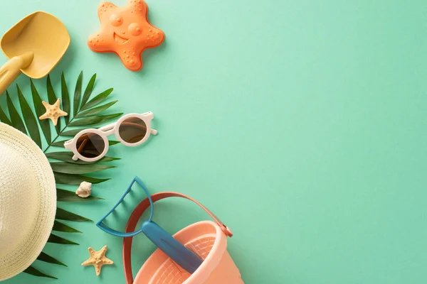 stock image Escape to a summer paradise with your little adventurers! Immerse in the magic of marine shells, sand toys for endless play, panama hats for style and trendy sunglasses on turquoise isolated backdrop