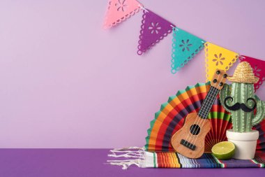 Festive arrangement featuring a cactus, ukulele, lime, and colorful decorations for a Mexican celebration clipart