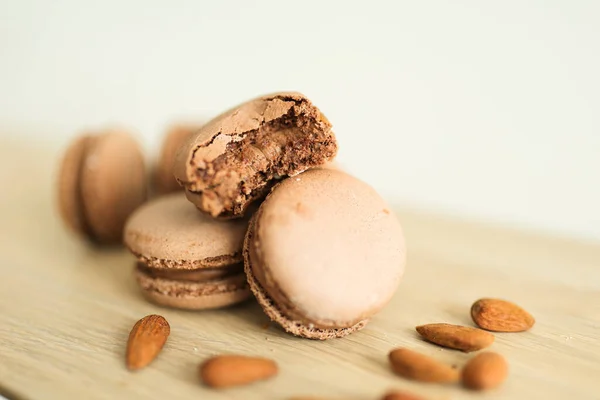 Delicious Chocolate Macaroons Almonds Wooden Table — Stock Photo, Image