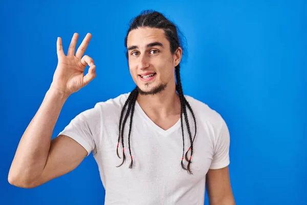 Hispanic Man Long Hair Standing Blue Background Smiling Positive Doing — Stockfoto