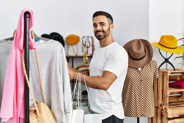 Young Hispanic Man Customer Choosing Clothes Shopping Clothing Store — Stock Photo, Image