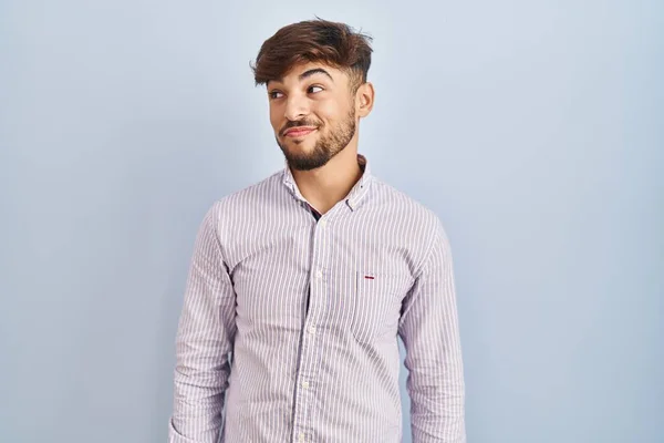 Arab Man Beard Standing Blue Background Smiling Looking Side Staring — Stockfoto
