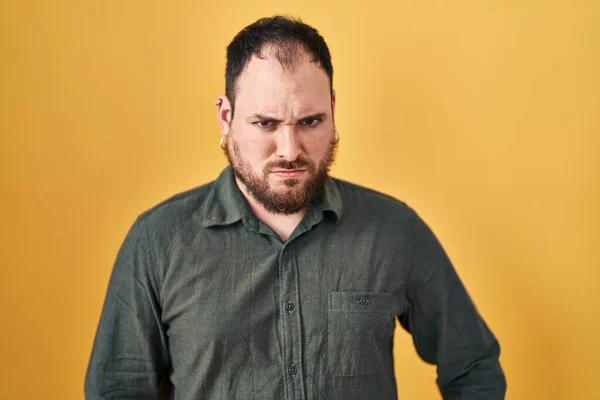 Size Hispanic Man Beard Standing Yellow Background Skeptic Nervous Frowning — Stockfoto