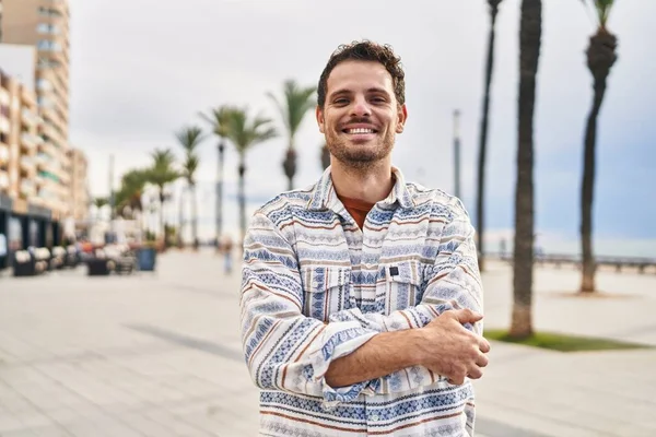 Young Hispanic Man Smiling Confident Standing Arms Crossed Gesture Street — Foto de Stock