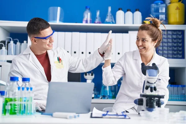 Man Woman Scientists High Five Hands Raised Laboratory — Stock Photo, Image