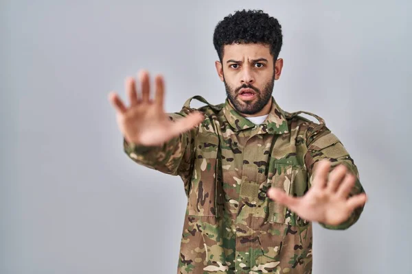 Arab Man Wearing Camouflage Army Uniform Doing Stop Gesture Hands — Stock Photo, Image