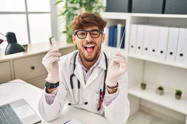 Arab Doctor Man Beard Holding Covid Test Sticking Tongue Out — Stockfoto
