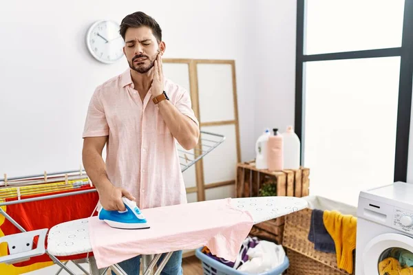 Young Man Beard Ironing Clothes Home Touching Mouth Hand Painful — Foto Stock