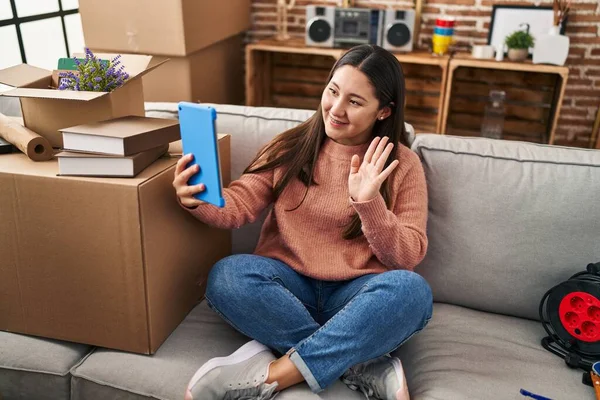 Young Latin Woman Sitting Sofa New Home Doing Video Call — Foto de Stock