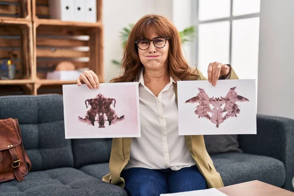Middle Age Hispanic Woman Working Rorschach Test Psychology Clinic Puffing — Zdjęcie stockowe