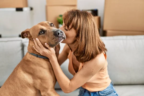 Young Caucasian Woman Kissing Hugging Dog Sitting Sofa Home — Photo