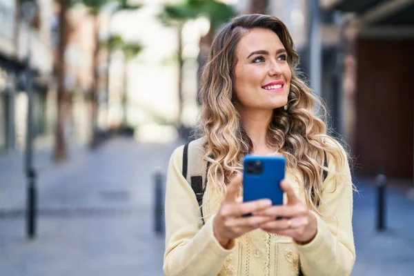 Young Woman Tourist Smiling Confident Using Smartphone Street — Stok fotoğraf