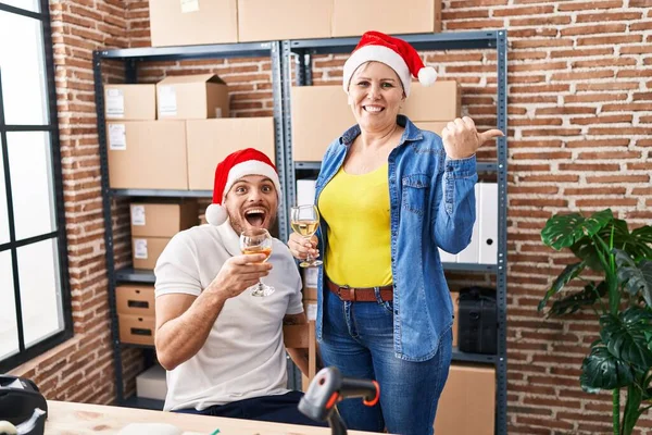 Hispanic Man Woman Working Small Business Ecommerce Drinking Wine Christmas — Zdjęcie stockowe