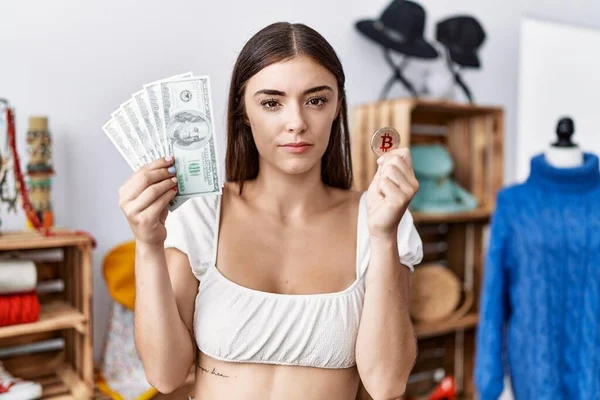 Young Hispanic Customer Woman Holding Dollars Banknotes Bitcoin Relaxed Serious — Stock Photo, Image
