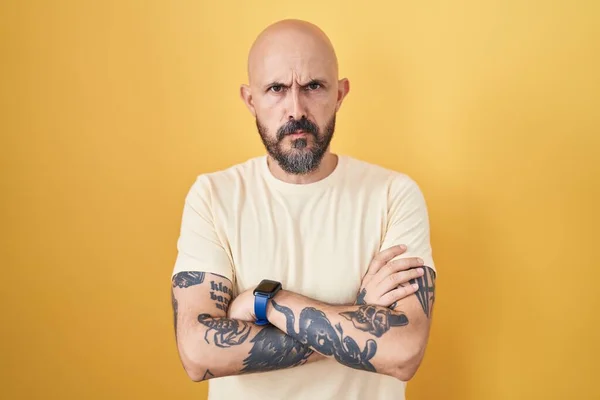 Hispanic Man Tattoos Standing Yellow Background Skeptic Nervous Disapproving Expression — Stock Photo, Image