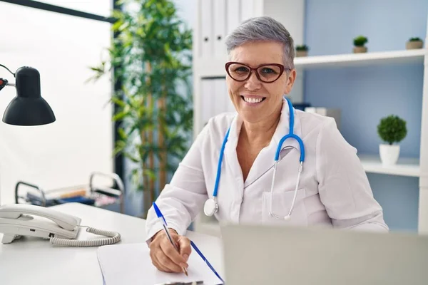 Middle Age Woman Wearing Doctor Uniform Working Clinic — Stock Photo, Image