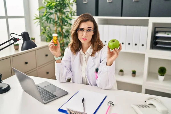 Young Woman Working Dietitian Clinic Skeptic Nervous Frowning Upset Because — Stock Photo, Image