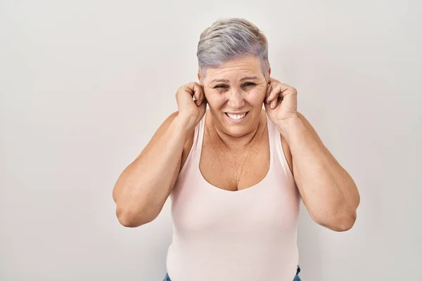 Middle Age Caucasian Woman Standing White Background Covering Ears Fingers — Fotografia de Stock