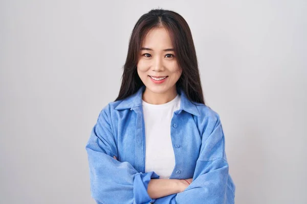 Young Chinese Woman Standing White Background Happy Face Smiling Crossed — Foto de Stock