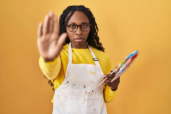 African Woman Holding Painter Palette Doing Stop Sing Palm Hand — Stock Photo, Image