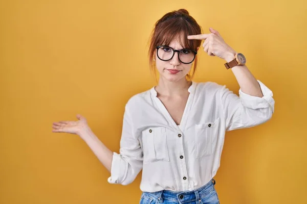 Young Beautiful Woman Wearing Casual Shirt Yellow Background Confused Annoyed — Stockfoto