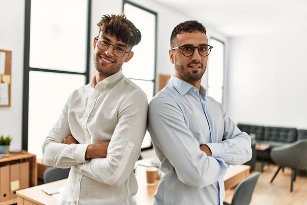 Two Hispanic Men Business Workers Standing Arms Crossed Gesture Office — Stock Photo, Image