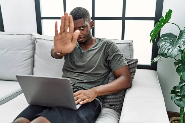 Young African American Man Using Laptop Home Sitting Sofa Doing — Stock Photo, Image